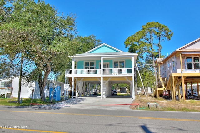 coastal inspired home with a carport