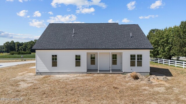 rear view of house featuring a patio area