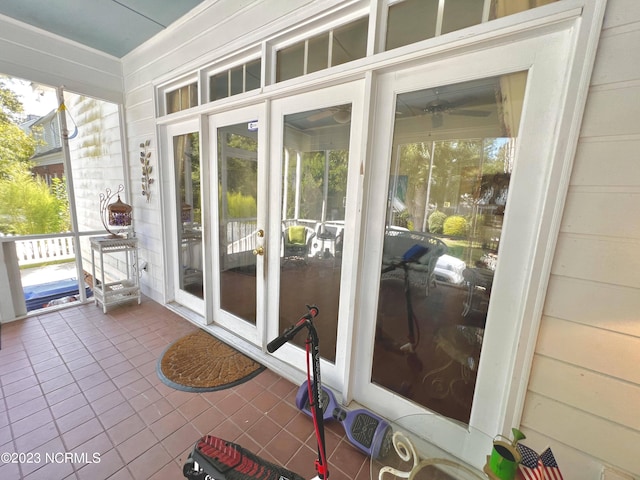 exterior space with ceiling fan and plenty of natural light