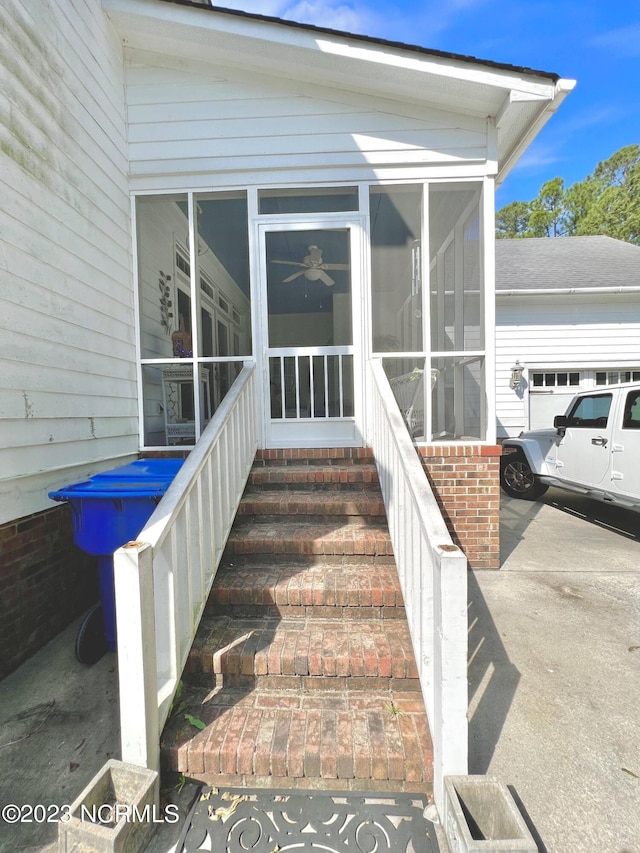 view of exterior entry featuring a garage