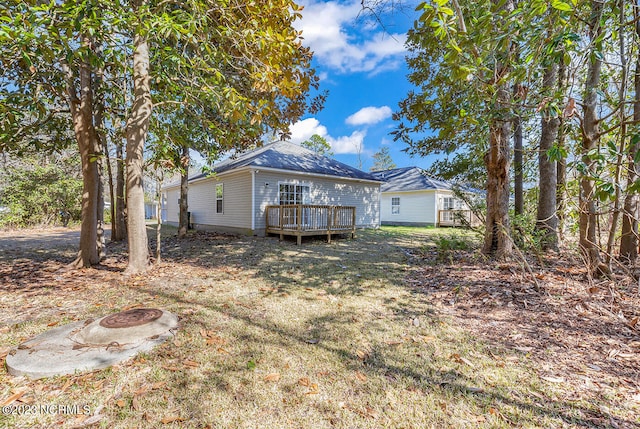 view of yard with a deck