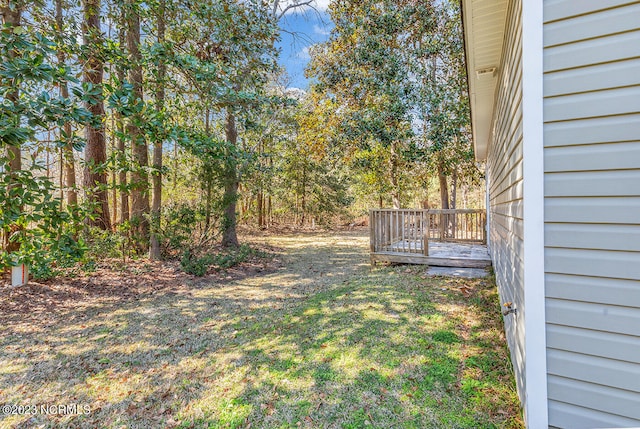 view of yard featuring a deck