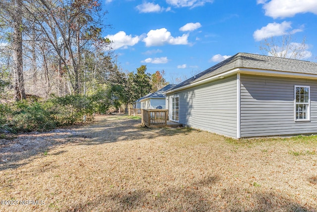 view of property exterior featuring a yard