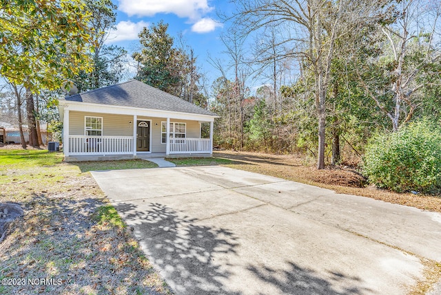 view of front of home featuring a porch and central AC unit