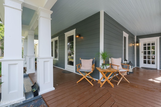 wooden terrace with covered porch