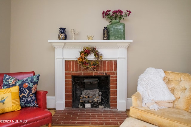 living area featuring a fireplace