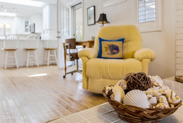 404 Mercer St, Oak Island, NC 28465 - living area with wood finished floors and plenty of natural light