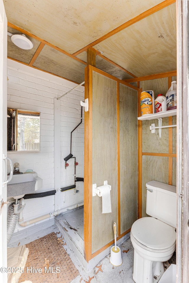404 Mercer St, Oak Island, NC 28465 - bathroom featuring toilet
