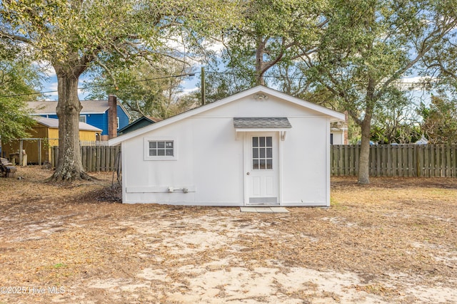 404 Mercer St, Oak Island, NC 28465 - view of outdoor structure with a fenced backyard