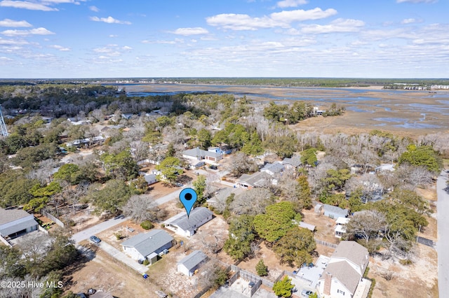 404 Mercer St, Oak Island, NC 28465 - aerial overview of property's location with nearby suburban area and a nearby body of water
