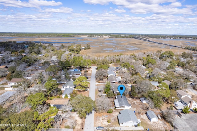 404 Mercer St, Oak Island, NC 28465 - aerial overview of property's location with nearby suburban area
