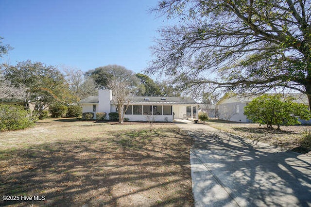 404 Mercer St, Oak Island, NC 28465 - back of house with concrete driveway