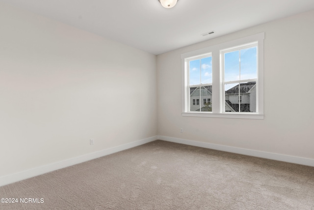 view of carpeted spare room