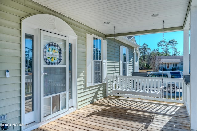 wooden deck featuring a porch