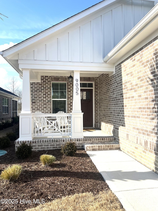 entrance to property with covered porch