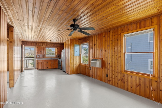 unfurnished room with wooden walls, a wall mounted air conditioner, ceiling fan, and wooden ceiling