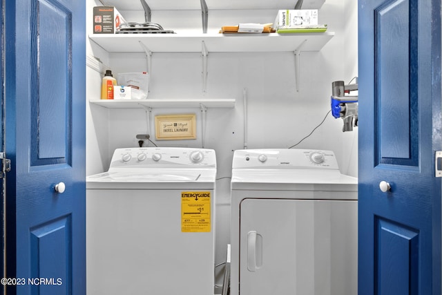 laundry room with washer and clothes dryer