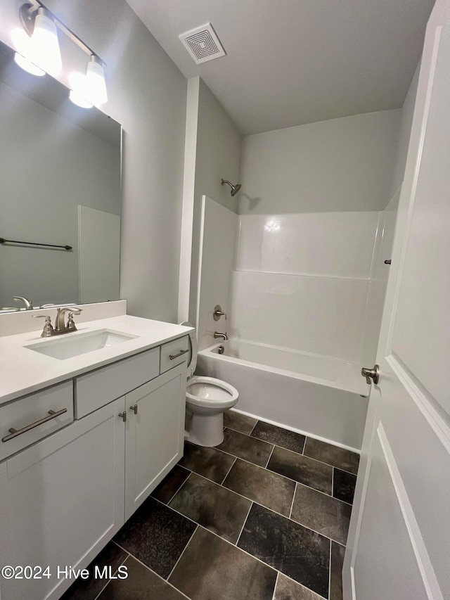 full bathroom featuring vanity, shower / bathing tub combination, and toilet