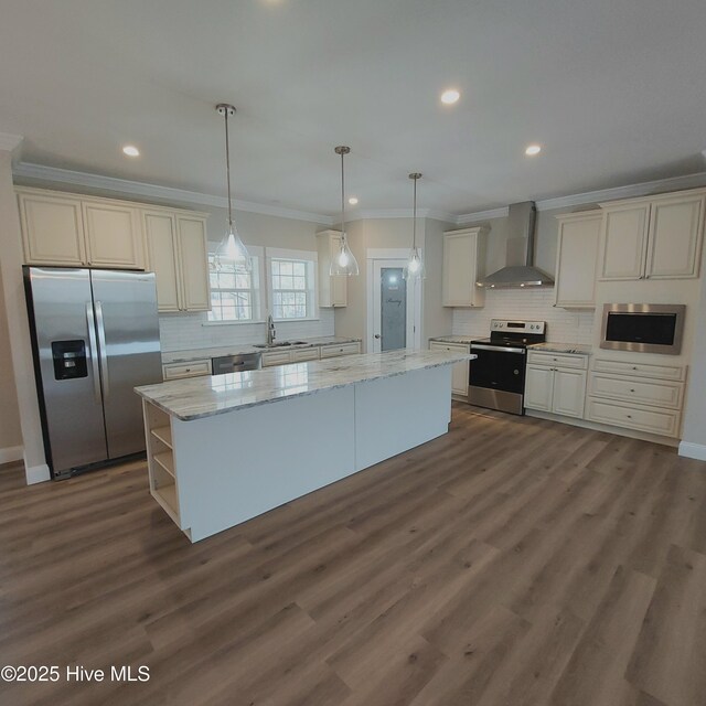 entrance foyer with ornamental molding, dark wood-style flooring, and a wealth of natural light