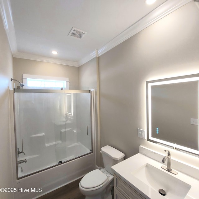 bathroom with shower / bath combination with glass door, visible vents, toilet, ornamental molding, and vanity