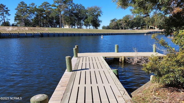 view of dock with a water view