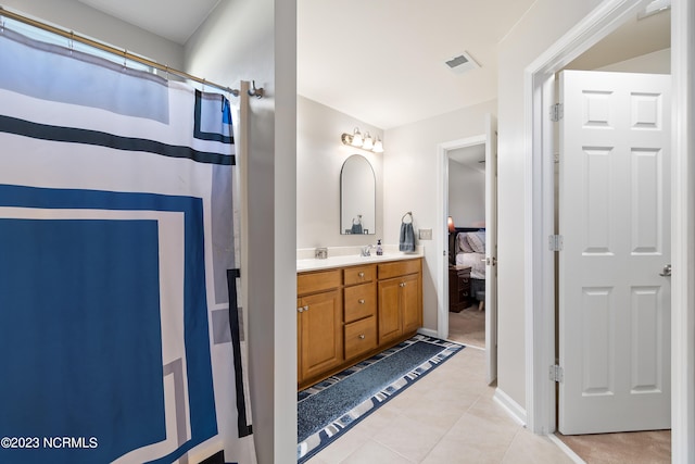 bathroom featuring vanity and tile patterned floors