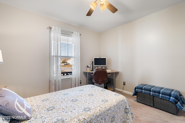 bedroom featuring light carpet and ceiling fan