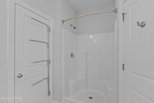 bathroom featuring walk in shower