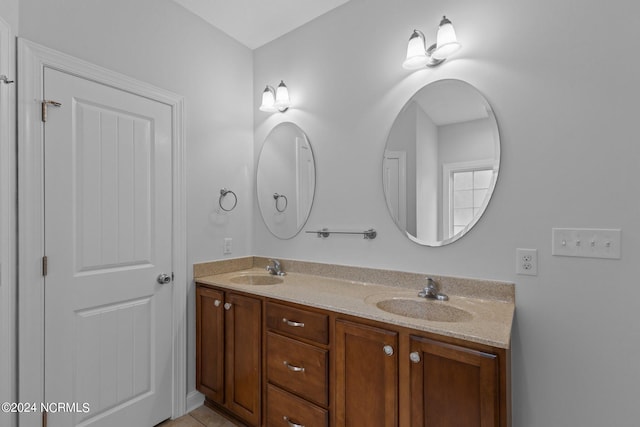 bathroom with vanity and tile patterned floors