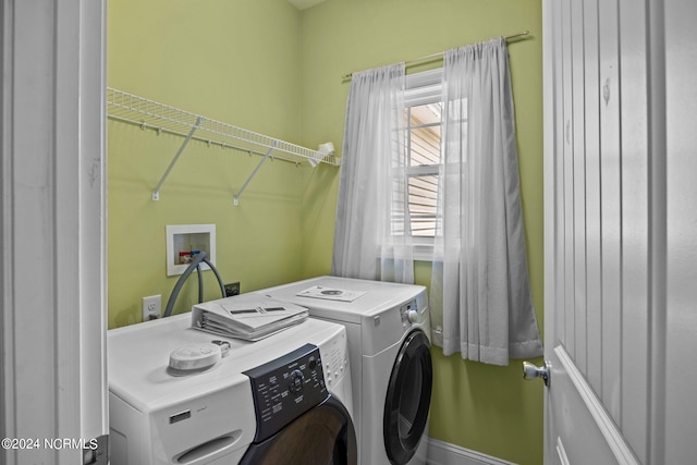 washroom featuring washer and dryer