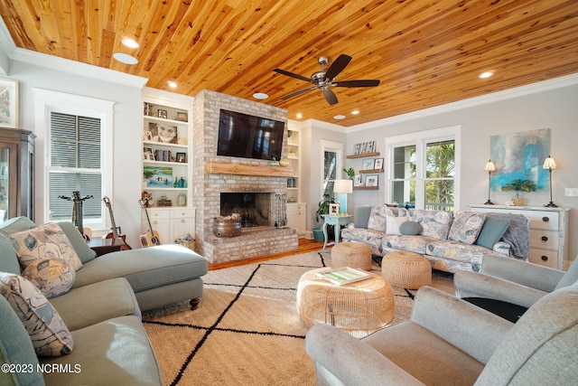 living room with a brick fireplace, crown molding, wooden ceiling, and built in features