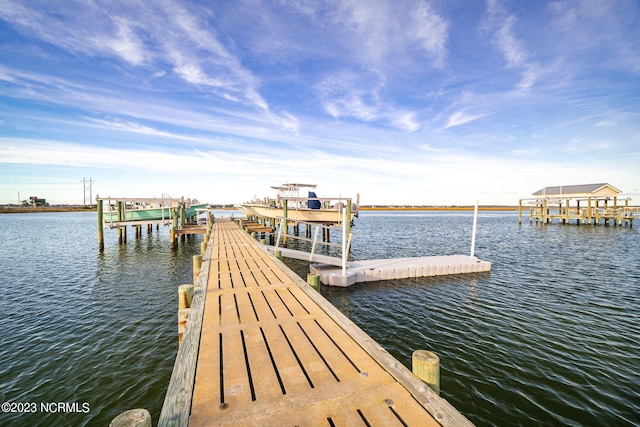 view of dock with a water view