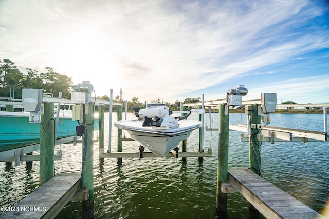 dock area featuring a water view