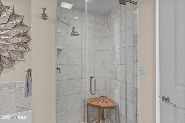 bathroom featuring walk in shower