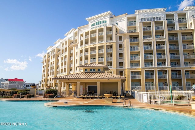 view of pool featuring a patio