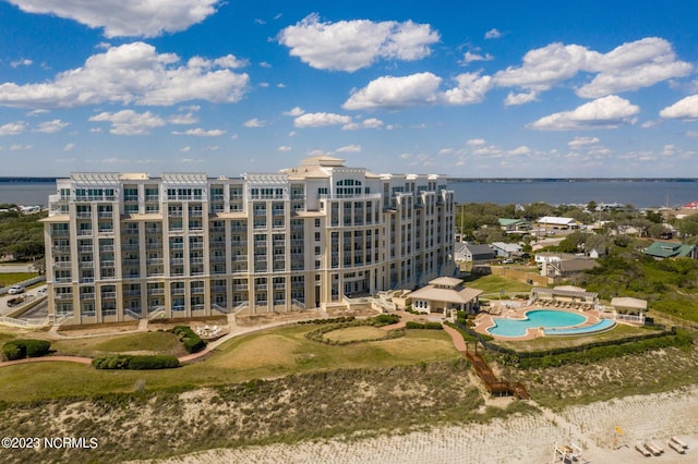 birds eye view of property featuring a water view