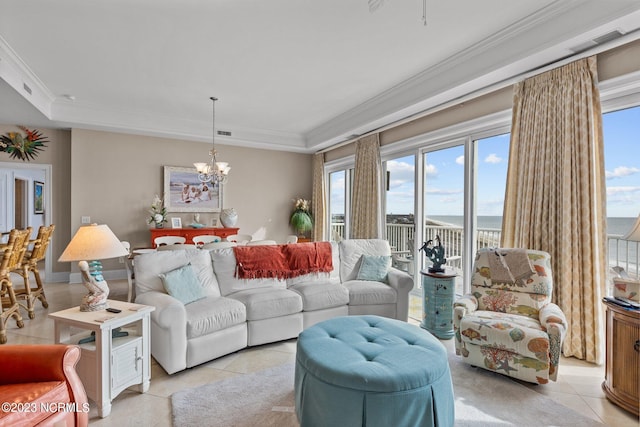 living room with an inviting chandelier, ornamental molding, and light tile floors