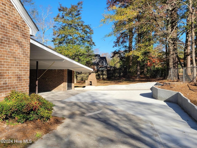 view of patio / terrace featuring a carport