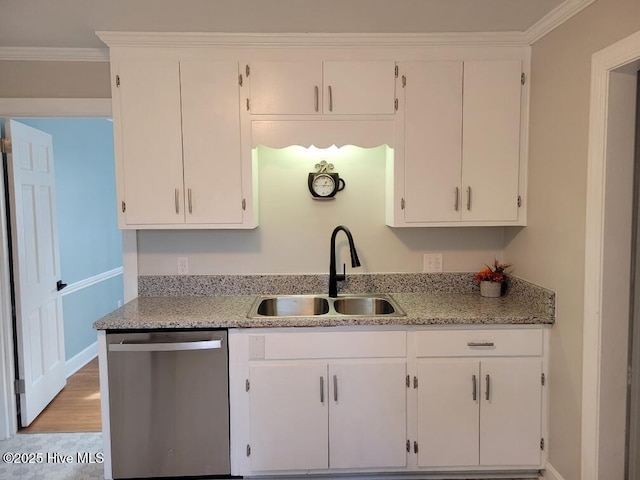 kitchen with white cabinetry, sink, stainless steel dishwasher, and ornamental molding