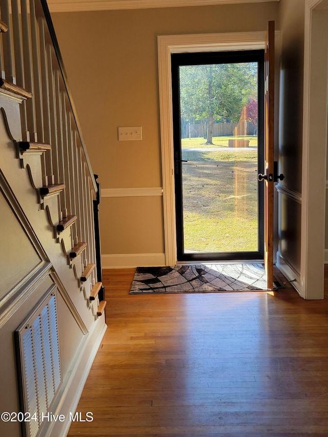 foyer featuring wood-type flooring