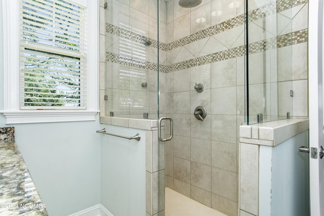 bathroom with walk in shower