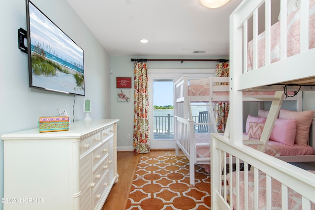 bedroom featuring light hardwood / wood-style floors