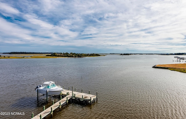 view of dock with a water view