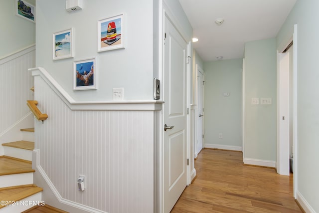 corridor featuring light hardwood / wood-style floors