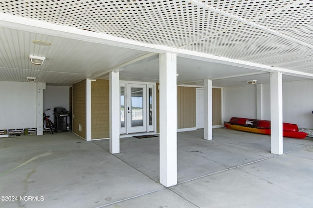 garage with a carport