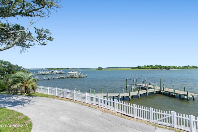 view of dock with a water view