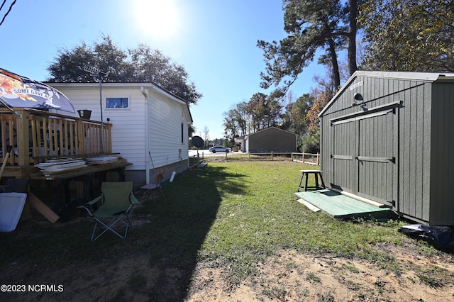 view of yard with a storage shed