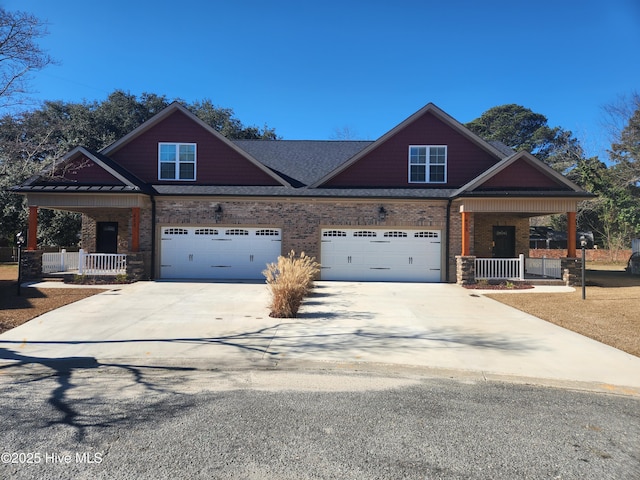 craftsman-style house featuring a garage and covered porch