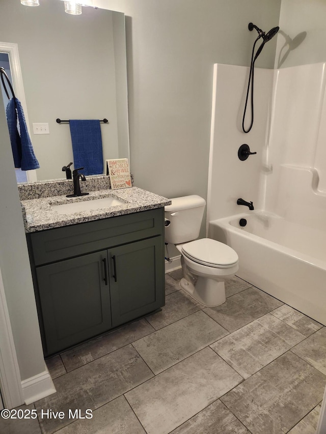 full bathroom featuring vanity, toilet, and shower / washtub combination