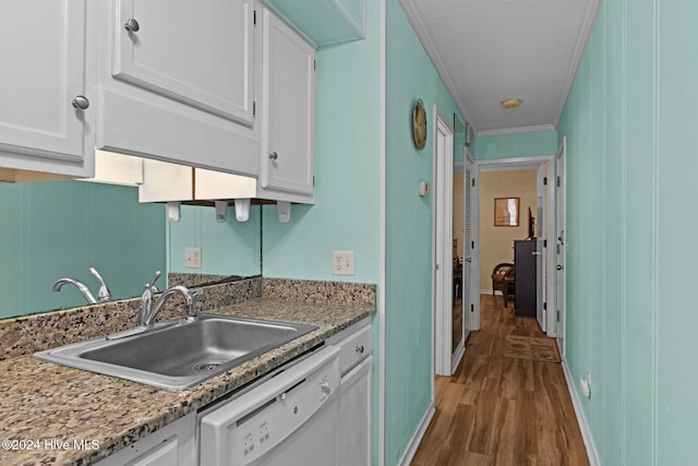 kitchen featuring light stone countertops, dark hardwood / wood-style flooring, white dishwasher, sink, and white cabinetry